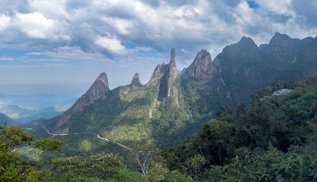 Dramatic green mountains with rugged cliffs